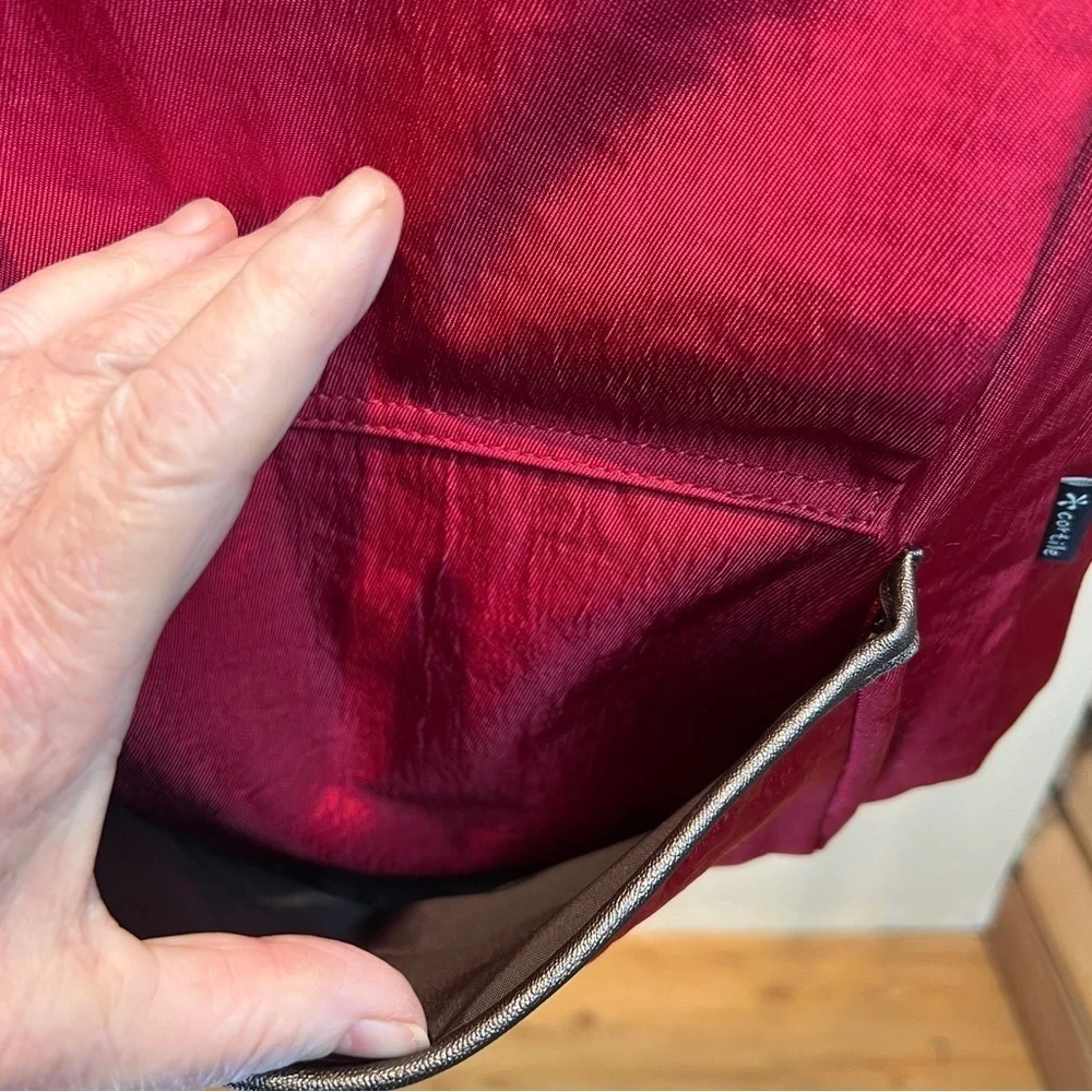 CORTILE FABRIC BACKPACK. Adj Straps. Front Flap Pocket w/snap & zipper pocket